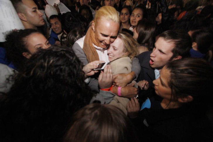 Swamp Party presidential candidate Christina Bonarrigo is embraced by her mother after winning the majority of votes to become UF Student Body president at the Reitz Union shortly after midnight Thursday.
