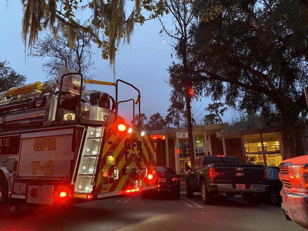 <p>Gainesville Fire Rescue responds Wednesday to smoke coming out of the Kappa Alpha fraternity house. </p>