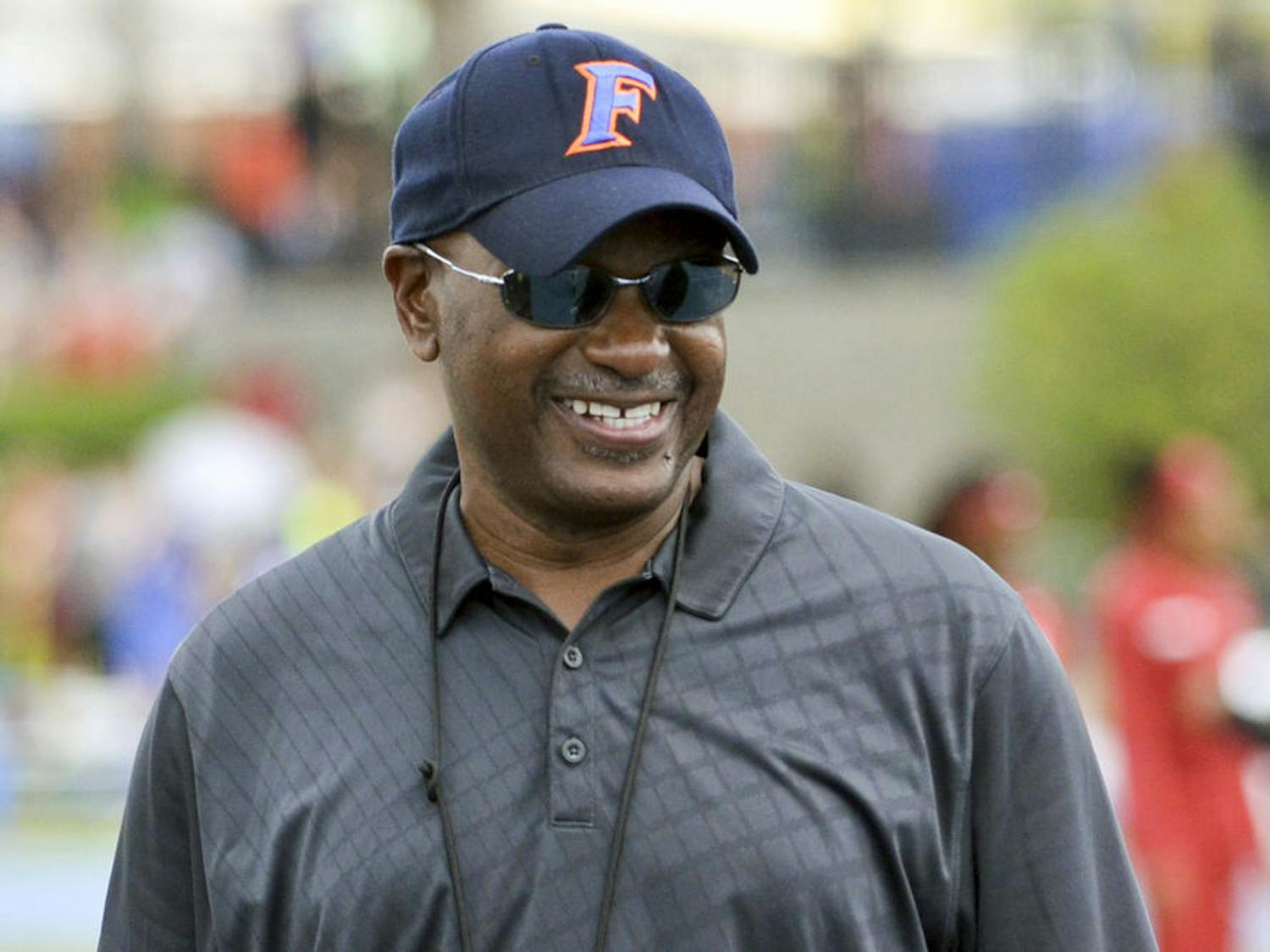 UF coach Mike Holloway smiles during the 2015 Florida Relays at James G. Pressly Stadium.
