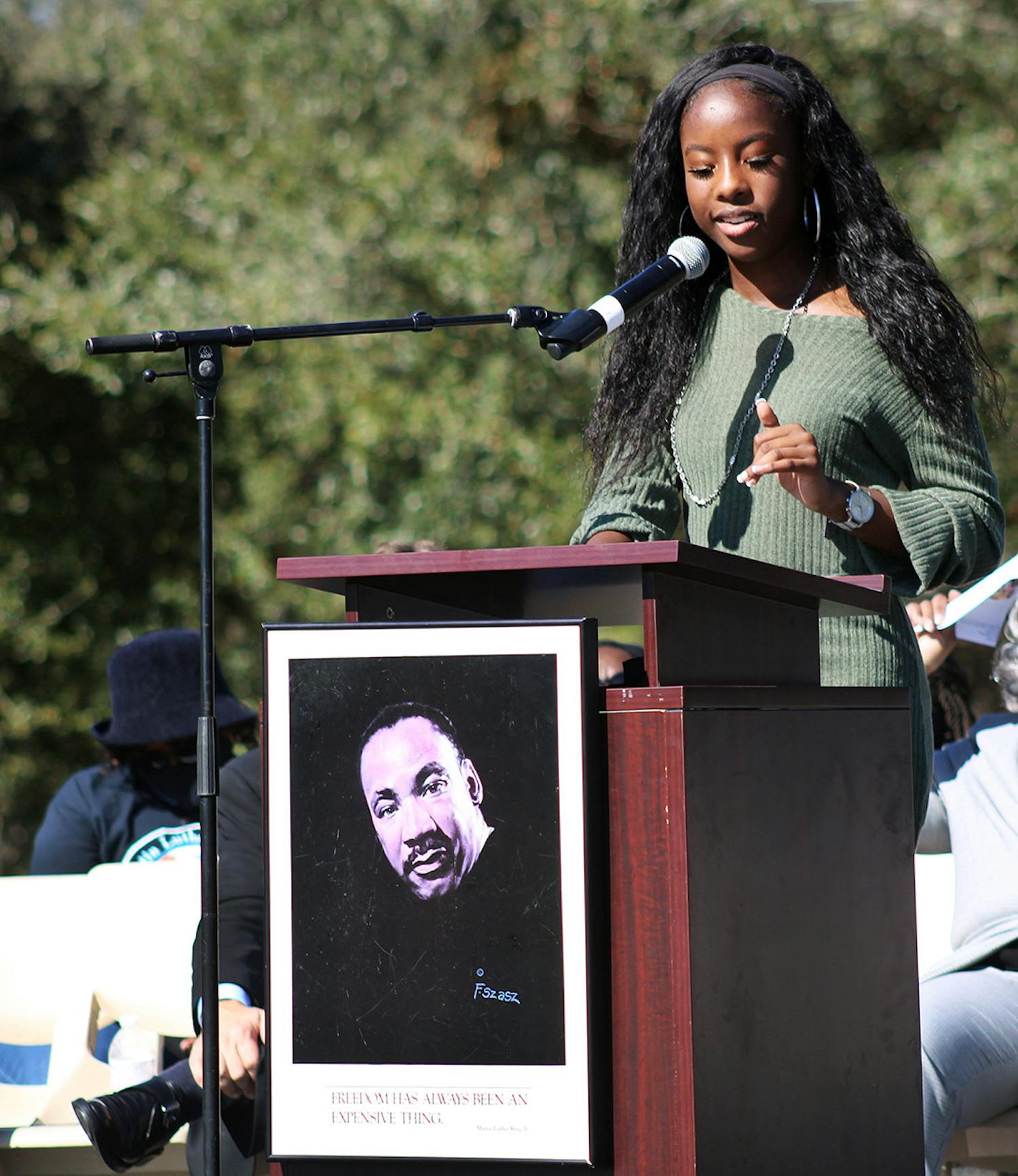 Taylor Hill-Miles, this year’s winner of the Edna M. Hart Keeper of the Dream Award, gives a keynote speech at Citizens Field on Martin Luther King Jr. Day. She talked about the importance of demanding justice for the Black community.
