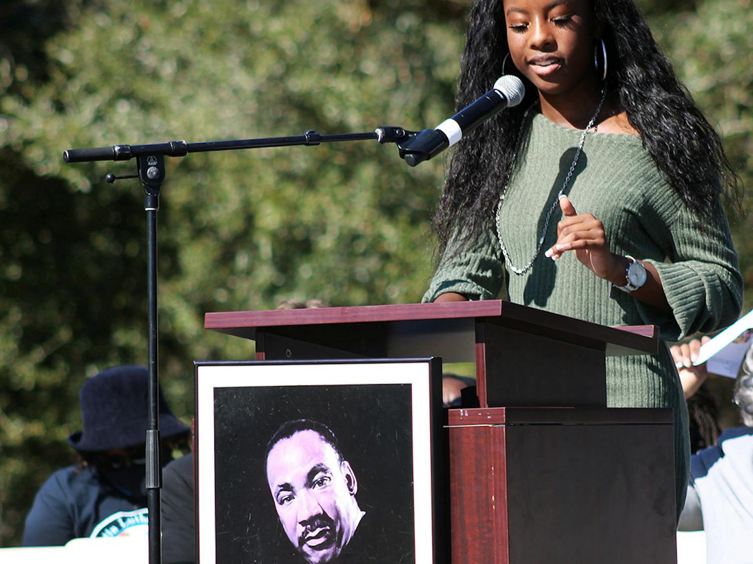Taylor Hill-Miles, this year’s winner of the Edna M. Hart Keeper of the Dream Award, gives a keynote speech at Citizens Field on Martin Luther King Jr. Day. She talked about the importance of demanding justice for the Black community.