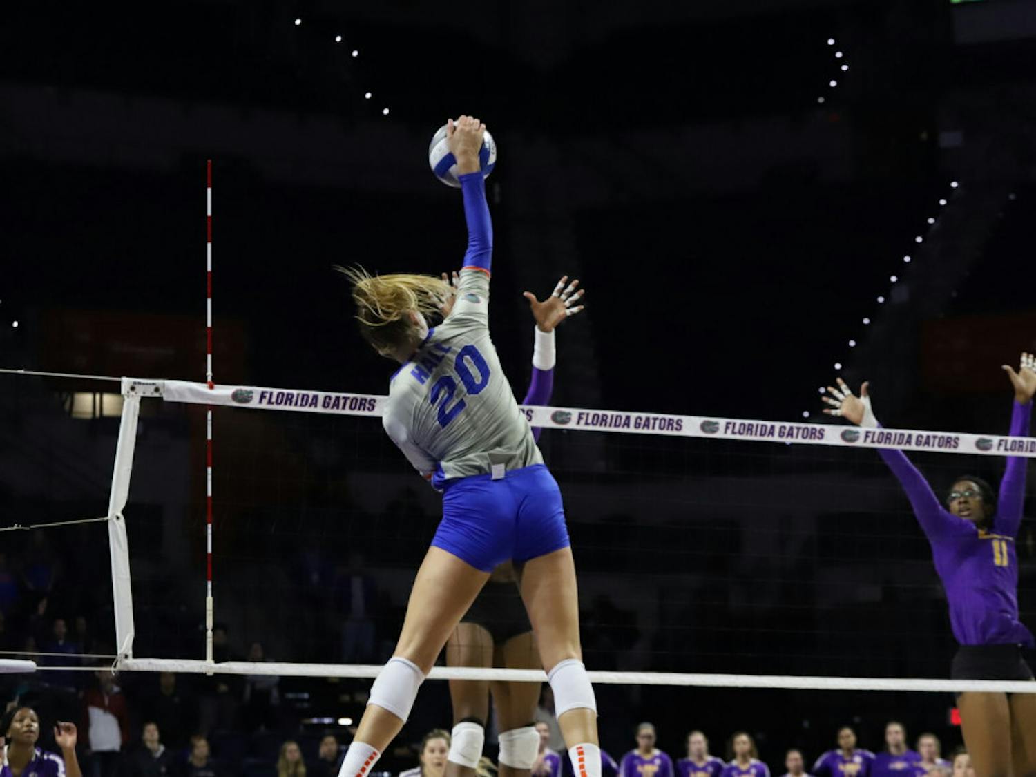 Florida's Thayer Hall spikes a ball against LSU in 2019. Hall recorded 13 kills in a 3-1 loss to No. 17 Baylor Friday night.