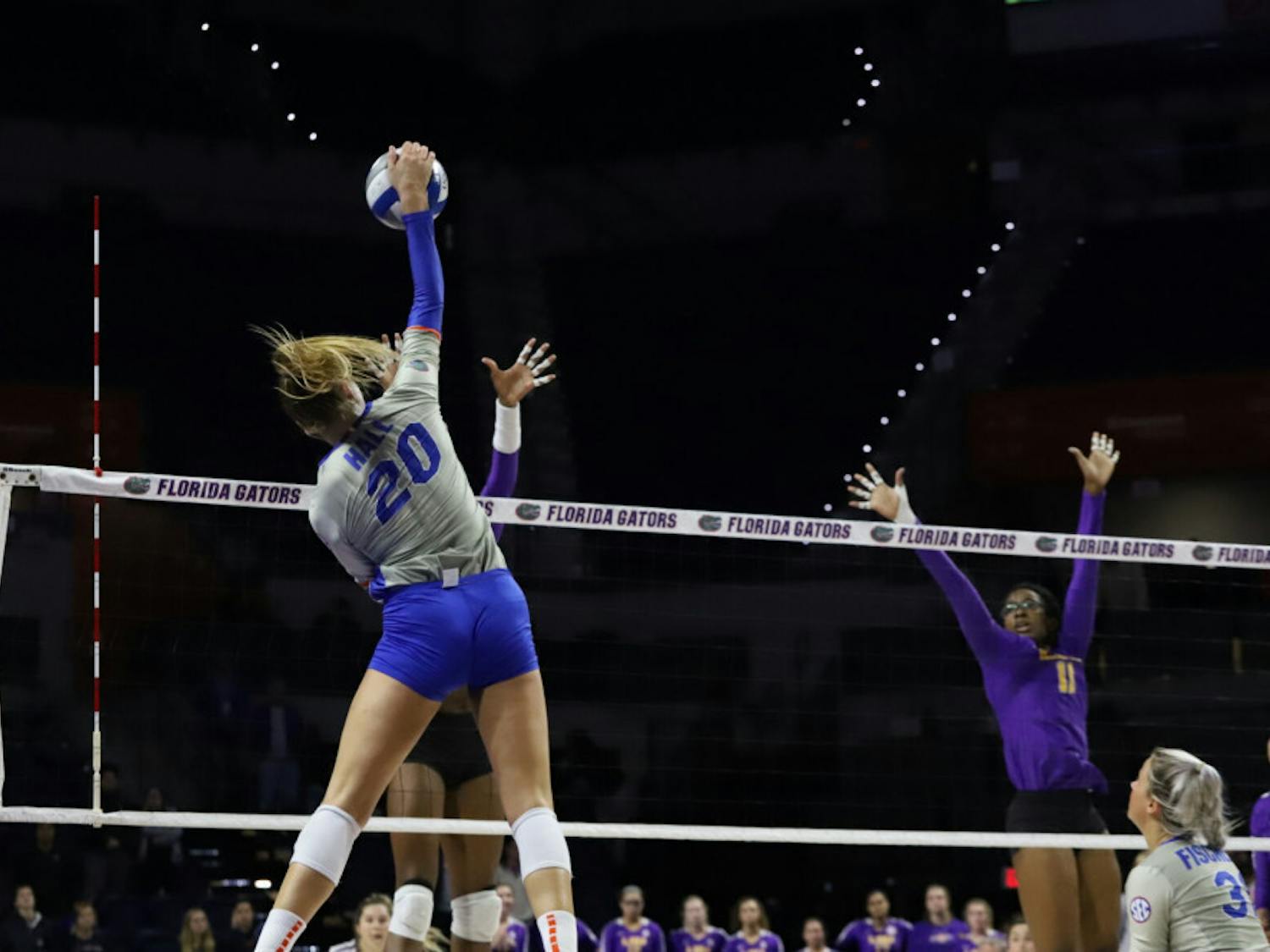 Florida&#x27;s Thayer Hall spikes a ball against LSU in 2019. Hall recorded 13 kills in a 3-1 loss to No. 17 Baylor Friday night.