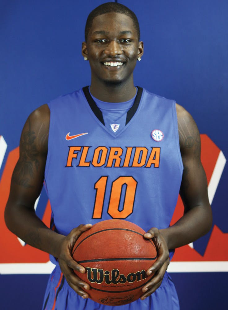 Dorian Finney-Smith poses for a photo during Florida’s basketball media day. The redshirt sophomore was one of two players suspended Thursday.