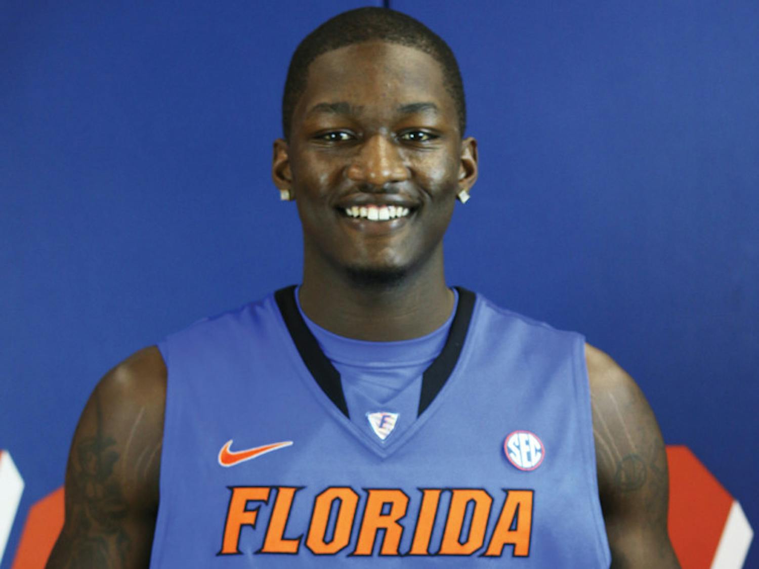 Dorian Finney-Smith poses for a photo during Florida’s basketball media day. The redshirt sophomore was one of two players suspended Thursday.