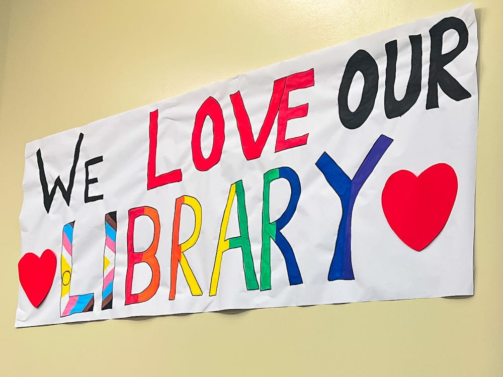 <p>The reopened Pride Center Library was decorated with rainbows and signs, including one banner that read &quot;We Love Our Library&quot; on Saturday, Feb. 15, 2025.</p>