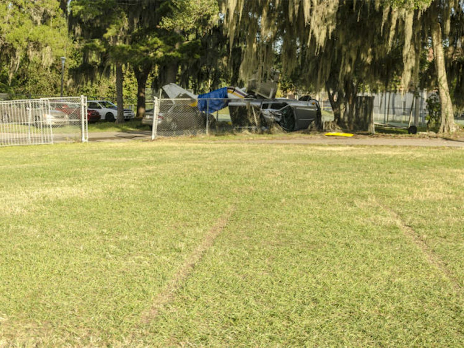 Tread marks are seen on Flavet Field on Saturday afternoon following a Cessna's emergency landing and crash.