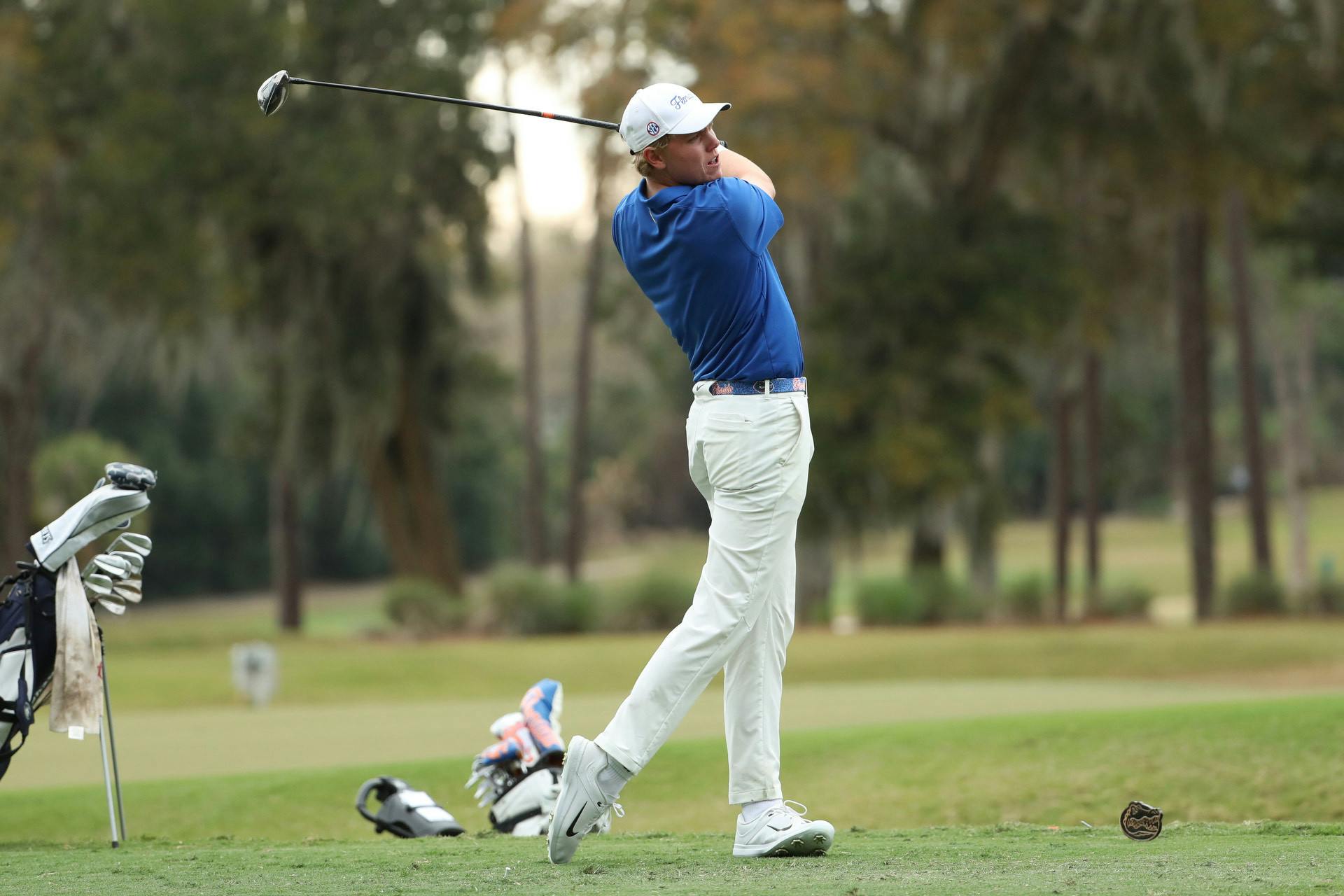 Gators junior Ian Gilligan hits a drive at the Gators Invitational on Friday, February 16, 2024.