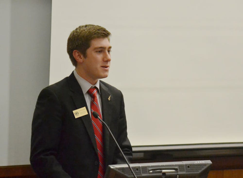 <p class="p1"><span class="s1">Elliot Grasso, Senate President Pro-Tempore, presents the Resolution Supporting the Implementation of Self-Service Bike Repair Stations On Campus on Tuesday night.</span></p>