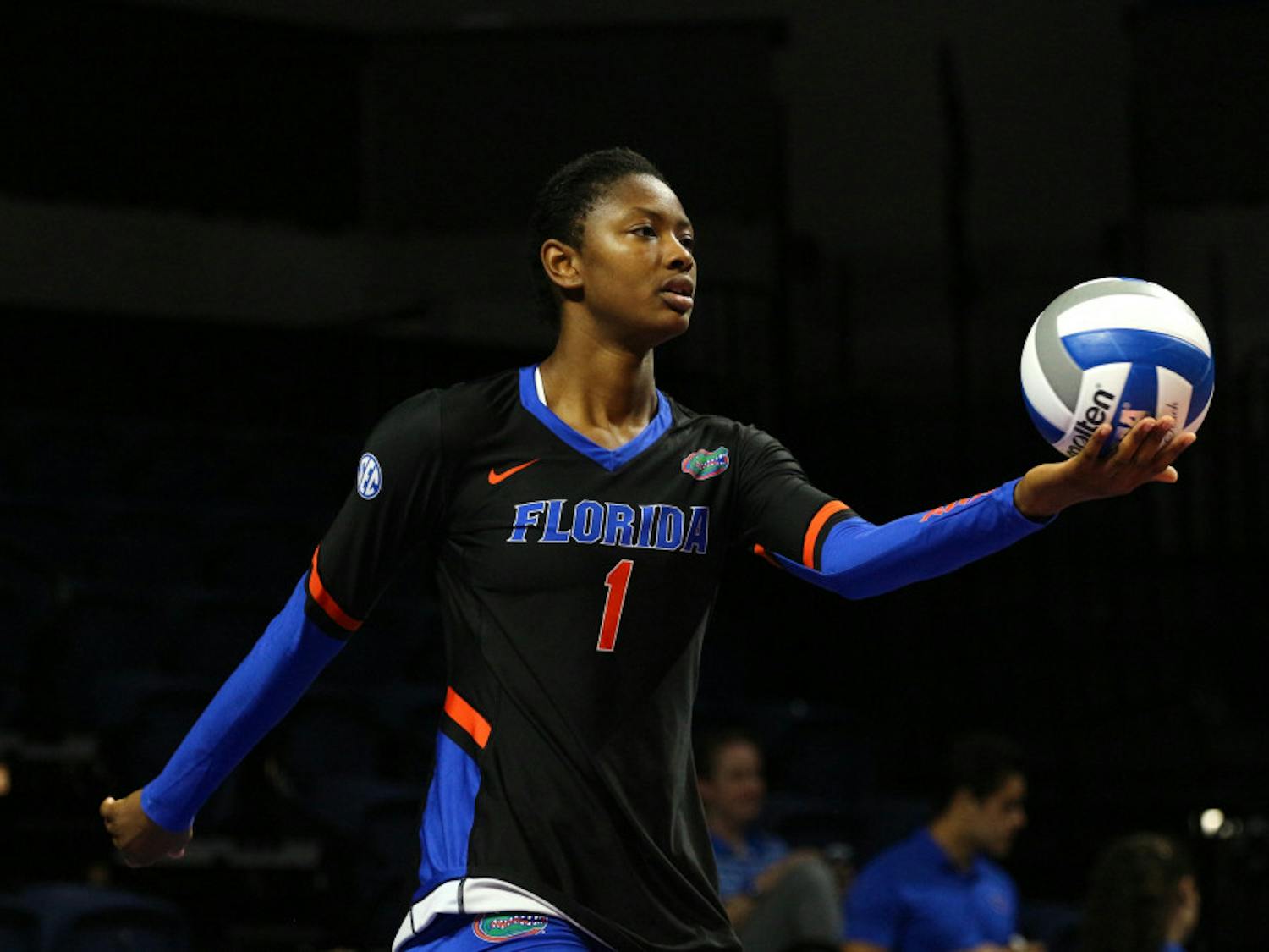 UF middle blocker Rhamat Alhassan holds the ball during Florida's 3-0 win against Florida A&M on Friday at the O'Connell Center.