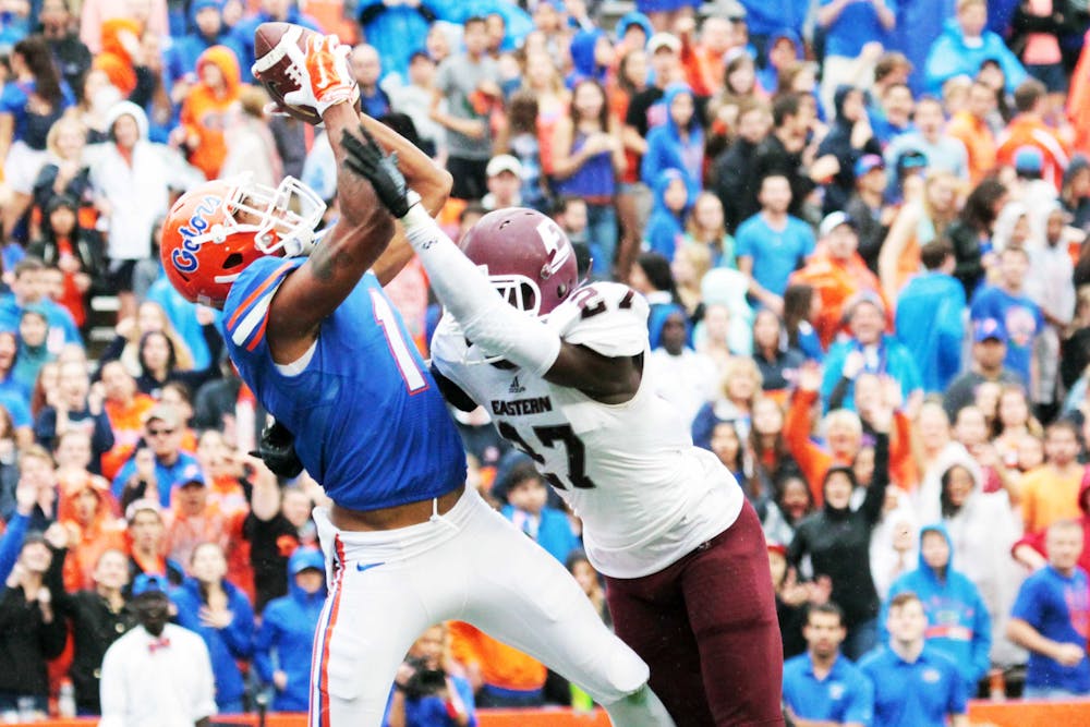 <p>Quinton Dunbar catches a pass during Florida's 52-3 win against Eastern Kentucky on Saturday at Ben Hill Griffin Stadium.</p>