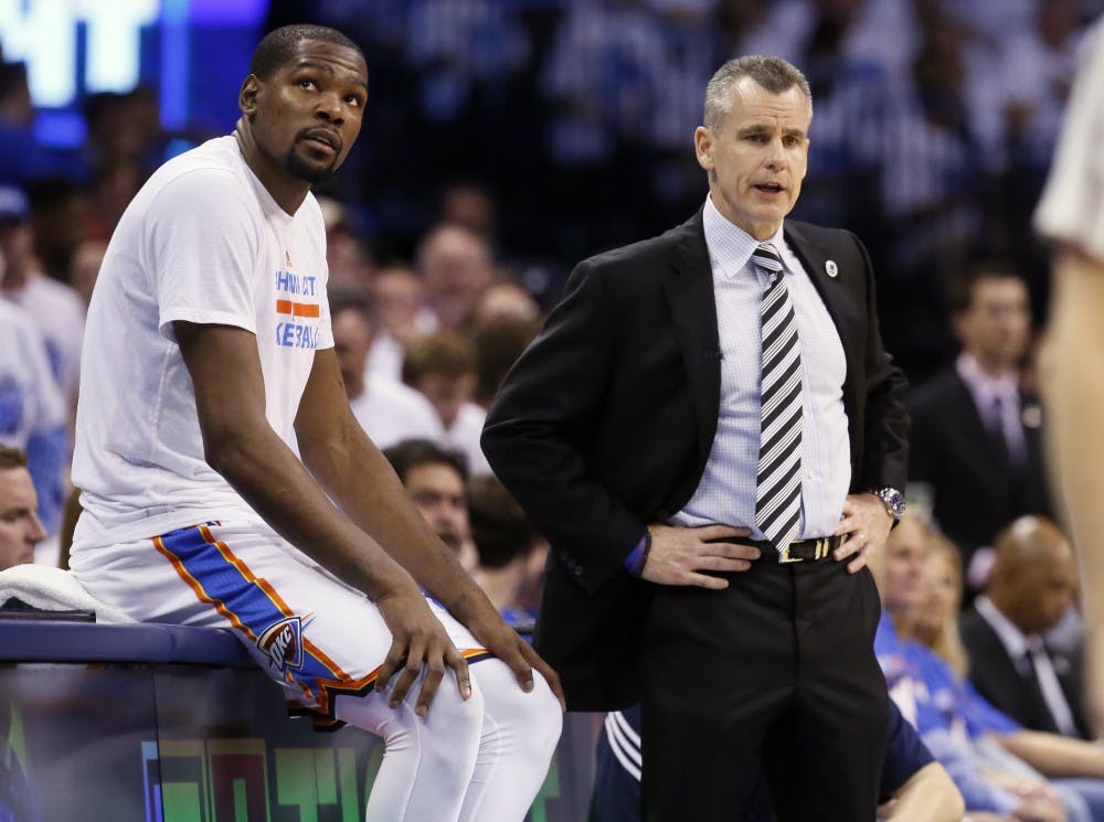 <p>Oklahoma City Thunder forward Kevin Durant (35) and head coach Billy Donovan watch from the sideline against the Golden State Warriors second half in Game 3 of the NBA basketball Western Conference finals in Oklahoma City, Sunday, May 22, 2016. (AP Photo/Sue Ogrocki)</p>