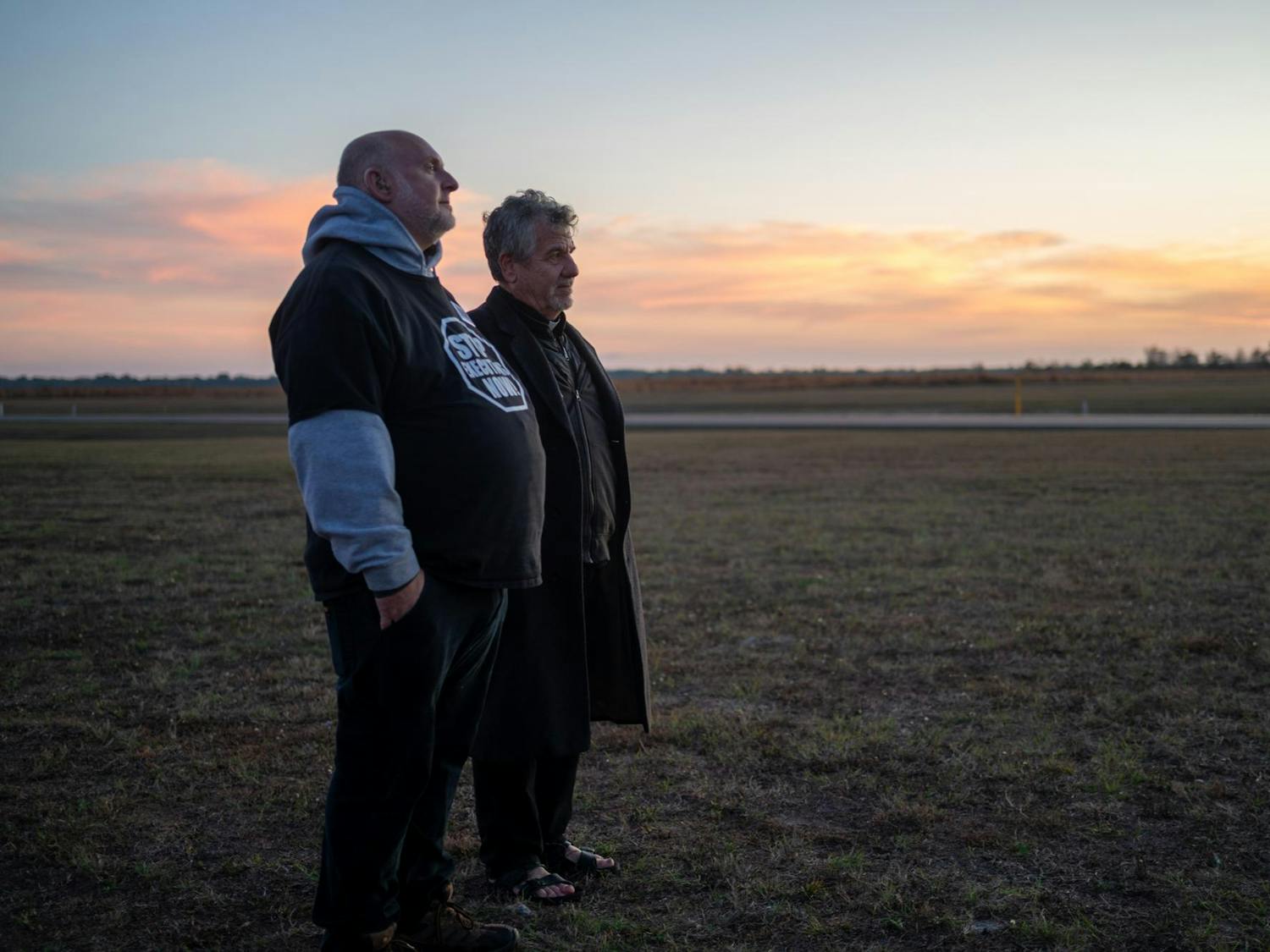 Reverend Phillip Egitto speaks with Abraham Bonowitz outside Florida State Prison in opposition to the execution of Mark Allen Geralds. Geralds was executed in Raiford on Tuesday, Dec. 9, 2025.