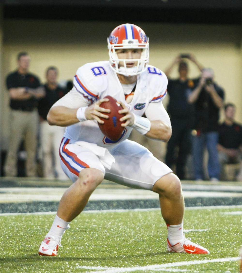 <p>Sophomore quarterback Jeff Driskel escpaes the pass rush against Vanderbilt on Oct. 13 at Vanderbilt Stadium. Driskel will start against Florida State on Saturday despite nursing a sprained right ankle, coach Will Muschamp announced on Wednesday.</p>