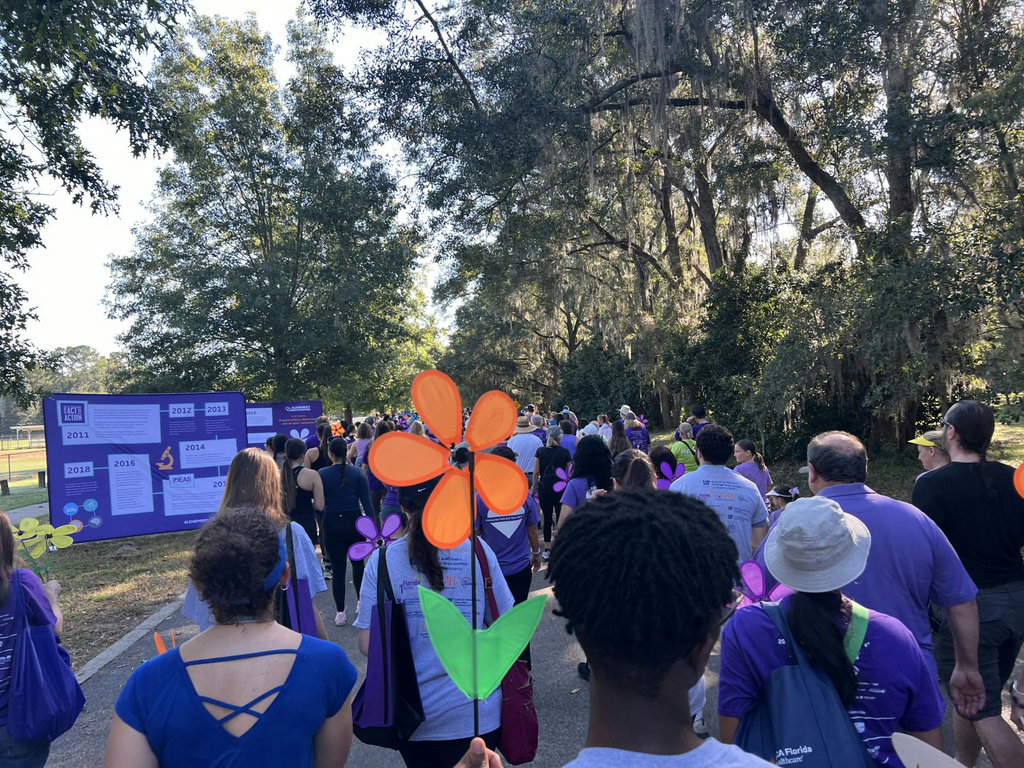 Attendees walk during the Walk to End Alzheimer’s on Saturday, Oct. 26, 2024. 