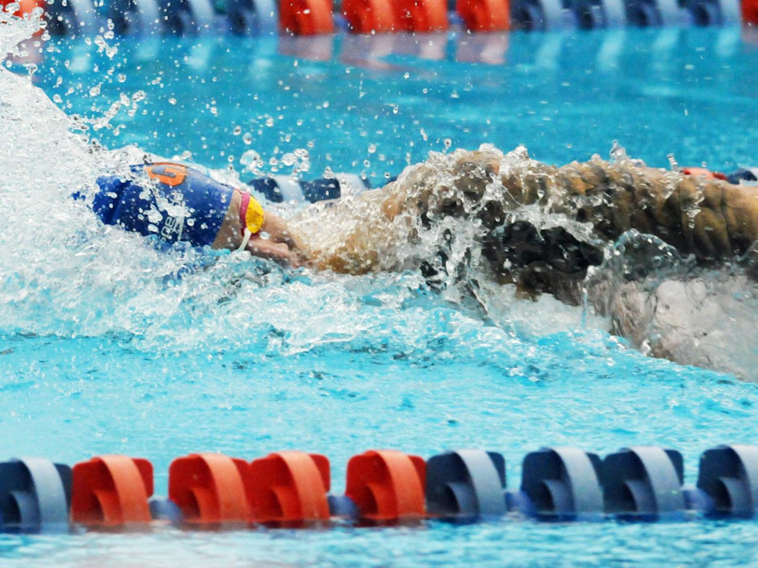 Caeleb Dressel races in the 400 meter freestyle relay during Florida’s meet against Auburn on Jan. 23, 2016, in the O’Connell Center.