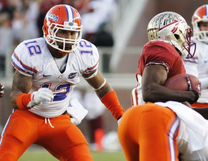 Linebacker Antonio Morrison attempts a tackle during Florida’s 37-26 win against Florida State on Saturday at Doak Campbell Stadium.&nbsp;