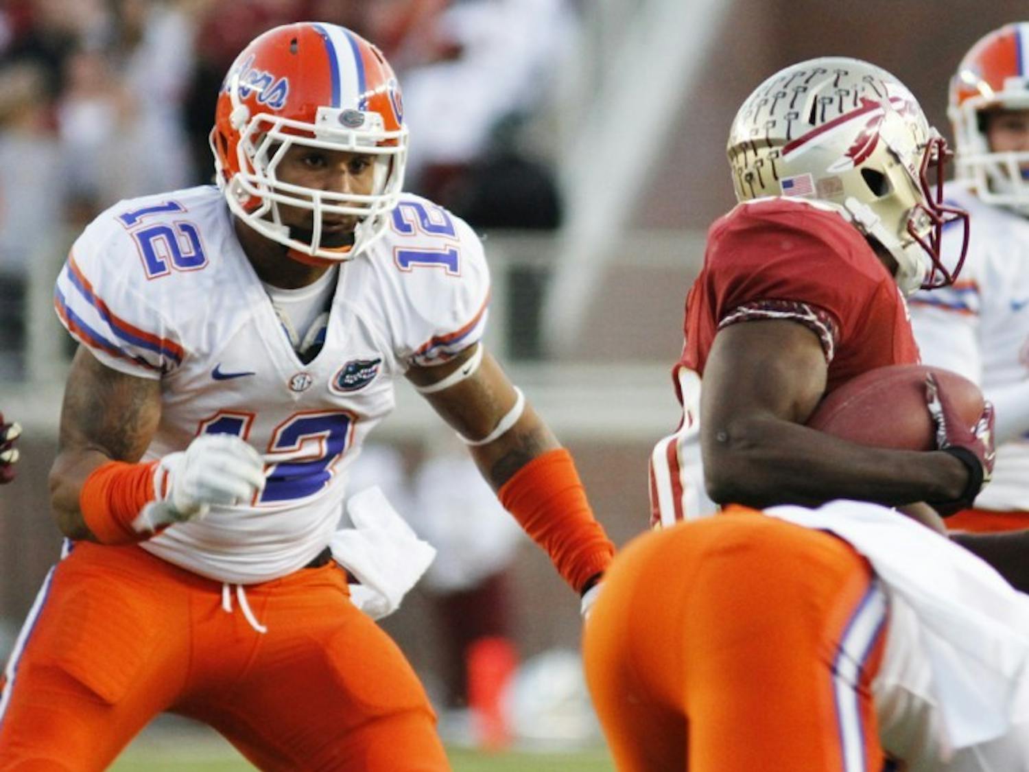 Linebacker Antonio Morrison attempts a tackle during Florida’s 37-26 win against Florida State on Saturday at Doak Campbell Stadium. 