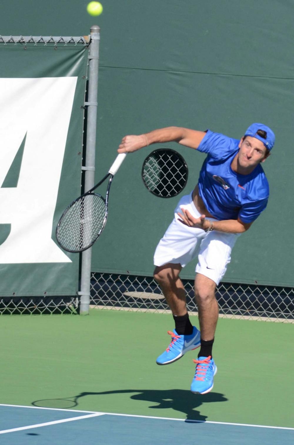 <p>Gordon Watson serves during Florida's 9-3 win against William &amp; Mary.</p>