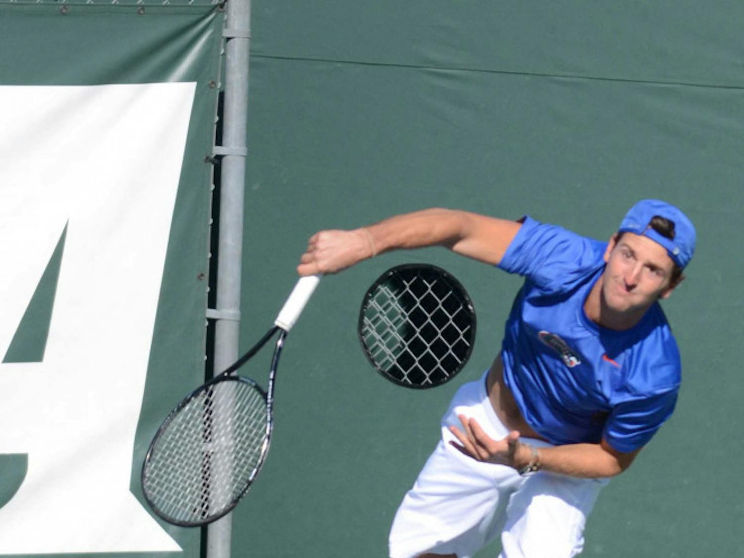 Gordon Watson serves during Florida's 9-3 win against William &amp; Mary.