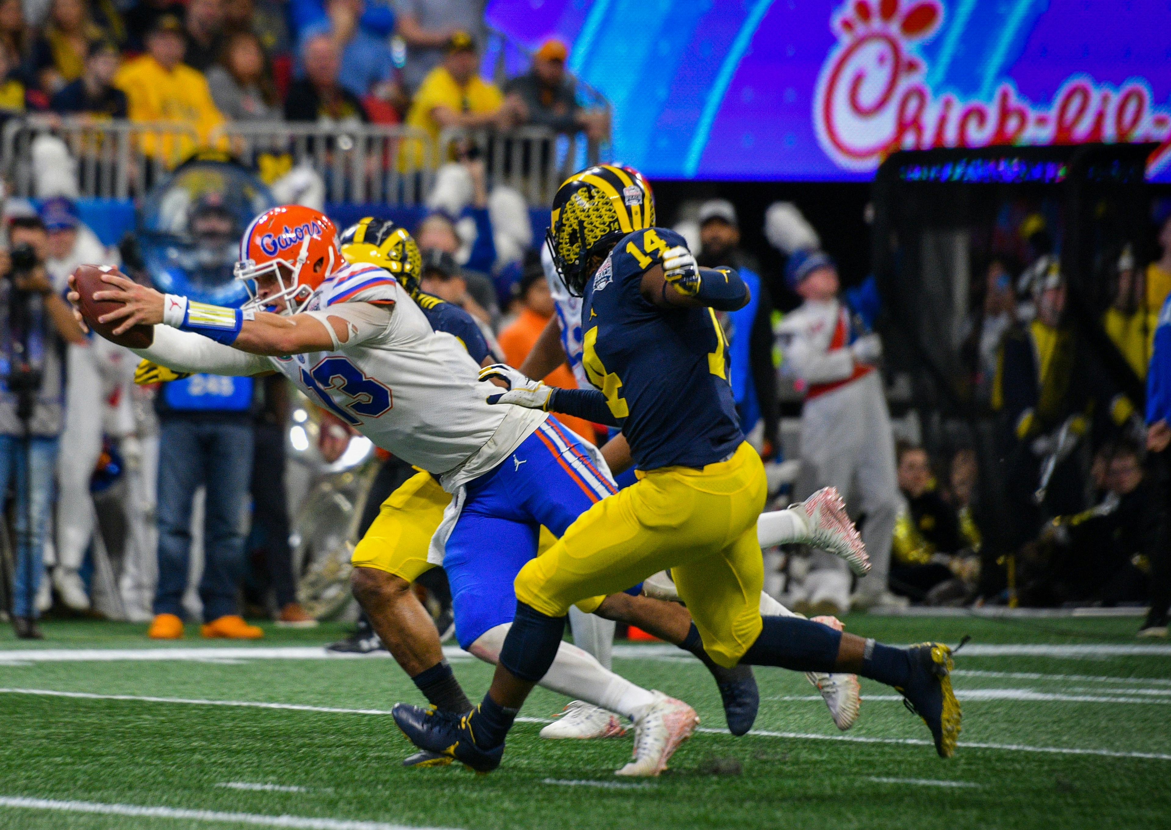 Gators quarterback Feleipe Franks threw for 173 yards and had two touchdowns in the Gators 41-15 Peach Bowl win over Michigan on Saturday.