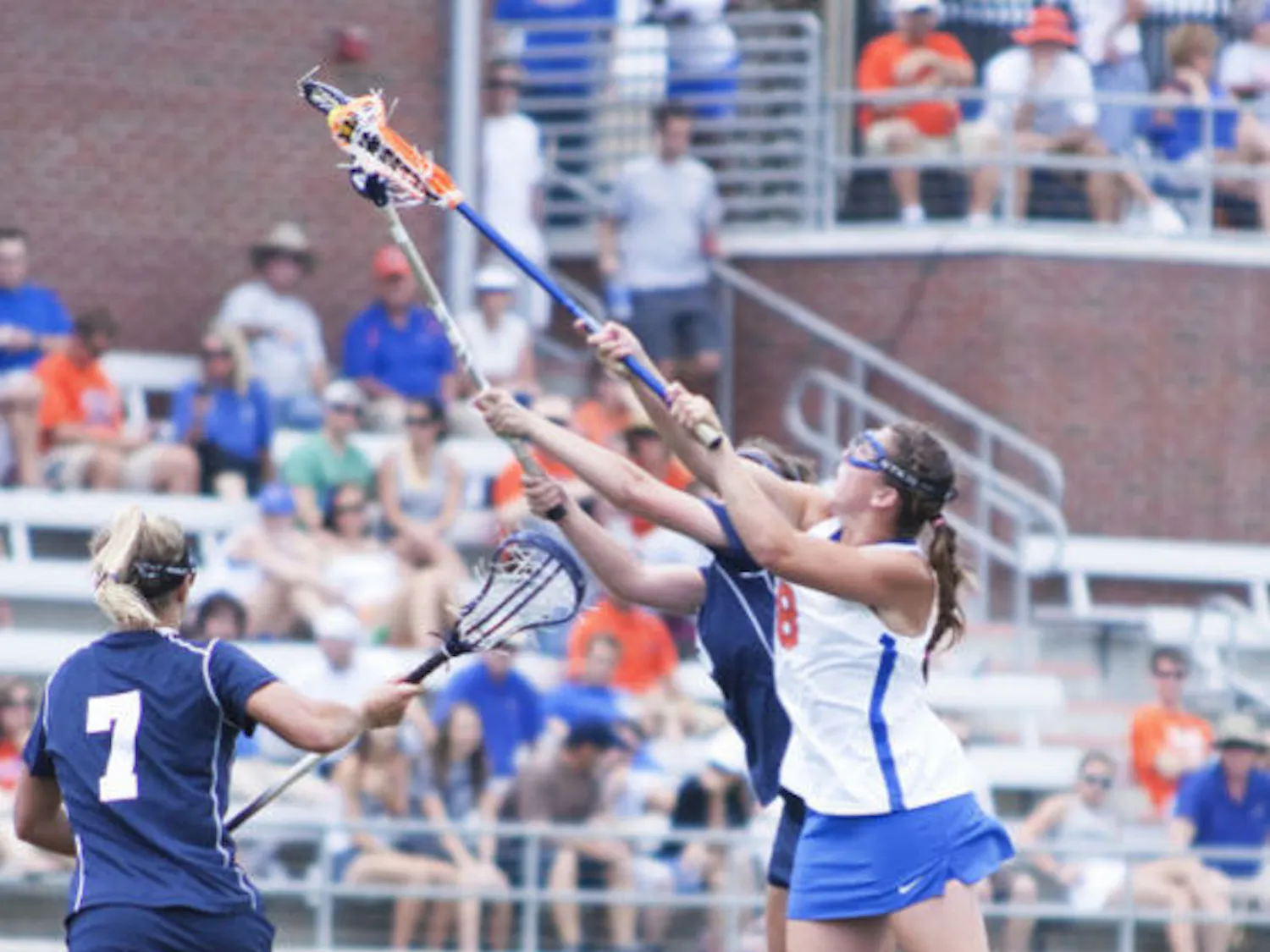 Shannon Gilroy fights for possession against Penn State on May 19, 2012. Gilroy scored one goal in UF’s season-opening loss to UNC.
