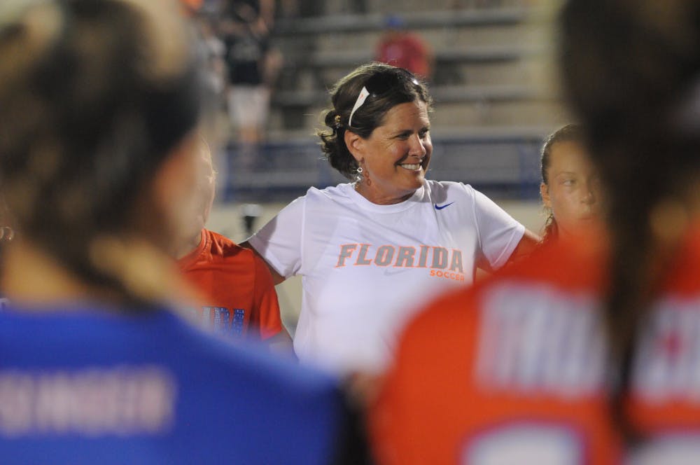 <p>UF soccer coach Becky Burleigh talks with her team following Florida's 5-2 win against Iowa State on Aug. 19, 2016, at James G. Pressly Stadium.</p>