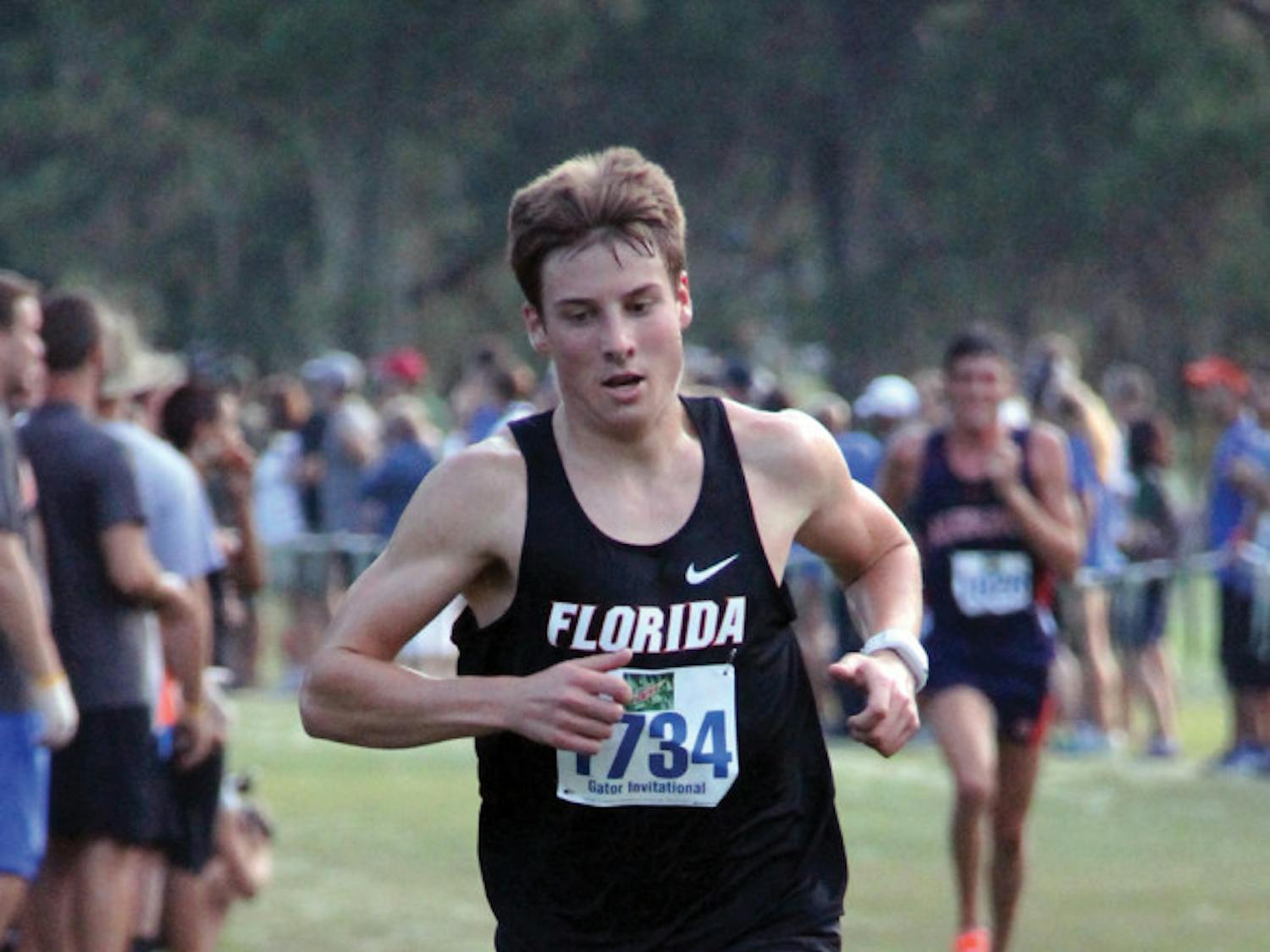Jimmy Clark runs at the Mountain Dew Invitational on Saturday in Gainesville. Clark won his race in 23:53.78.