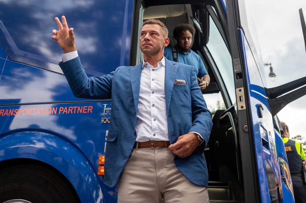 Florida head coach Jon Sumrall steps off the team bus before an NCAA college football game against FAU, Saturday, Sept. 5, 2026, in Gainesville, Fla.