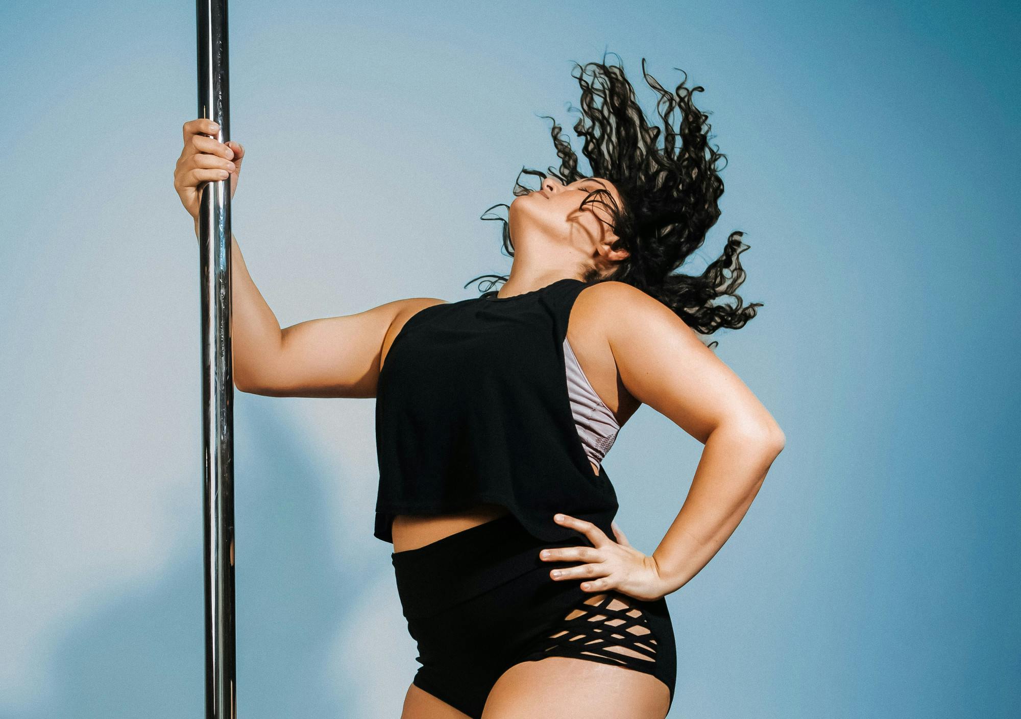 Owner of Happy Kiss Pole Dancing, Johanna Monserratte, poses for a portrait.