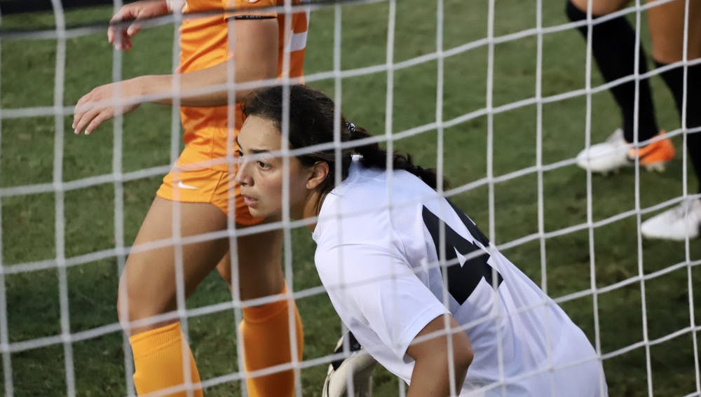 Gators goalkeeper Susi Espinoza guards the net from Tennessee defenders. Florida lost its fourth straight game this season on Friday night against the Volunteers.