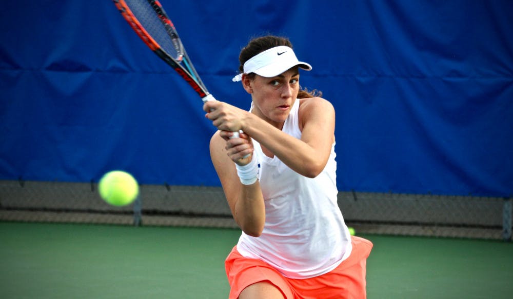 <p>Ingrid Neel returns a ball during Florida's 4-2 win over Oklahoma State on Feb. 18, 2017, at the Ring Tennis Complex.</p>