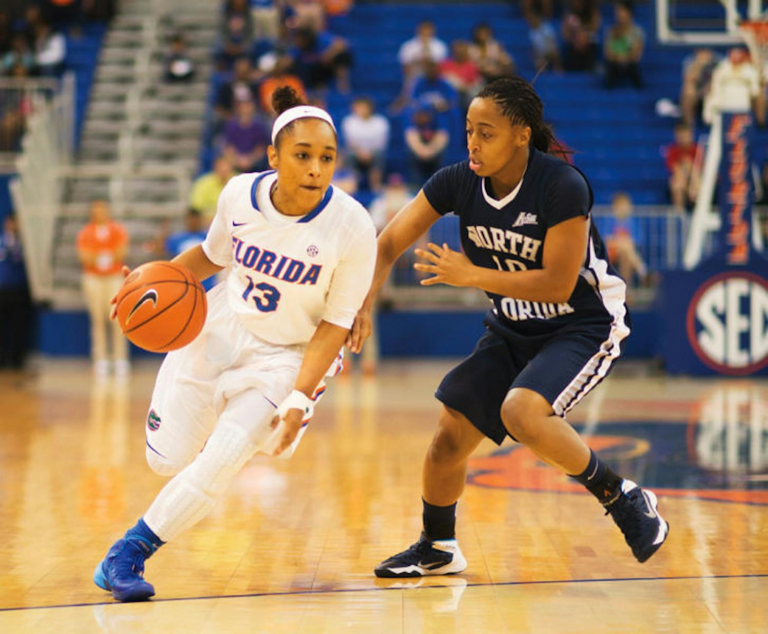 Cassie Peoples drives down the lane during Florida’s 88-77 win against North Florida on Nov. 10, 2013, in the O’Connell Center.