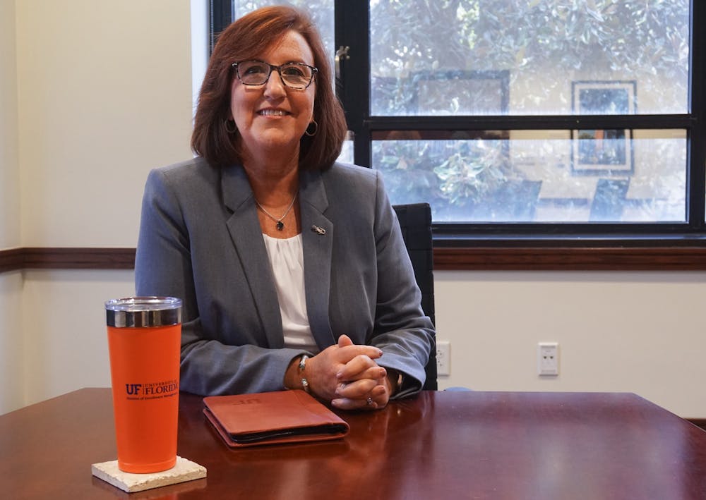 Mary Parker, the University of Florida’s new vice president for enrollment management and associate provost, poses for a portrait in her Criser Hall office on Thursday, Aug. 4, 2021.