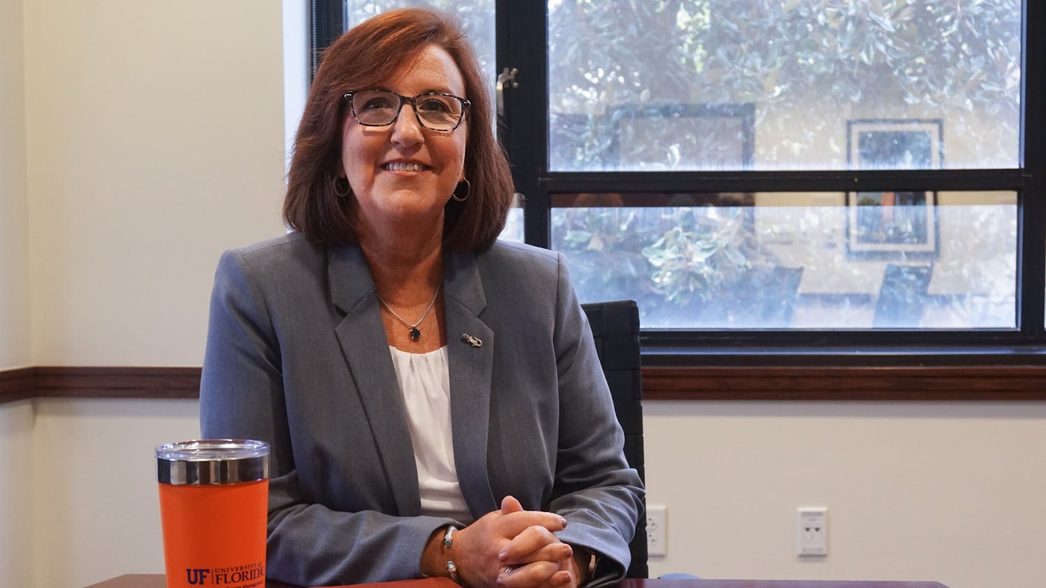 Mary Parker, the University of Florida’s new vice president for enrollment management and associate provost, poses for a portrait in her Criser Hall office on Thursday, Aug. 4, 2021.