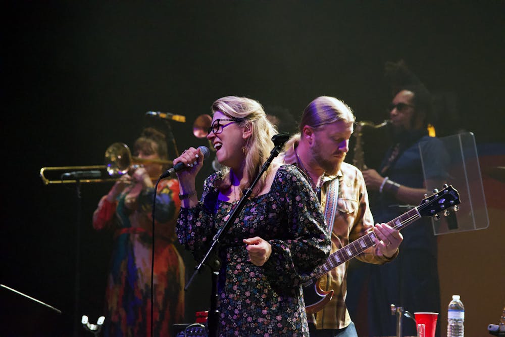 <p>Susan Tedeschi, lead singer of Tedeschi Trucks, sings beside her husband Derek Trucks during their opening song in the Phillips Center Sunday, Jan. 23, 2023.</p>