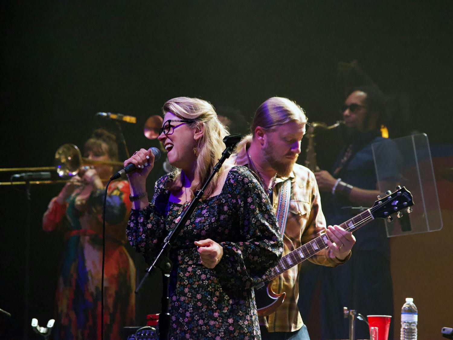 Susan Tedeschi, lead singer of Tedeschi Trucks, sings beside her husband Derek Trucks during their opening song in the Phillips Center Sunday, Jan. 23, 2023.