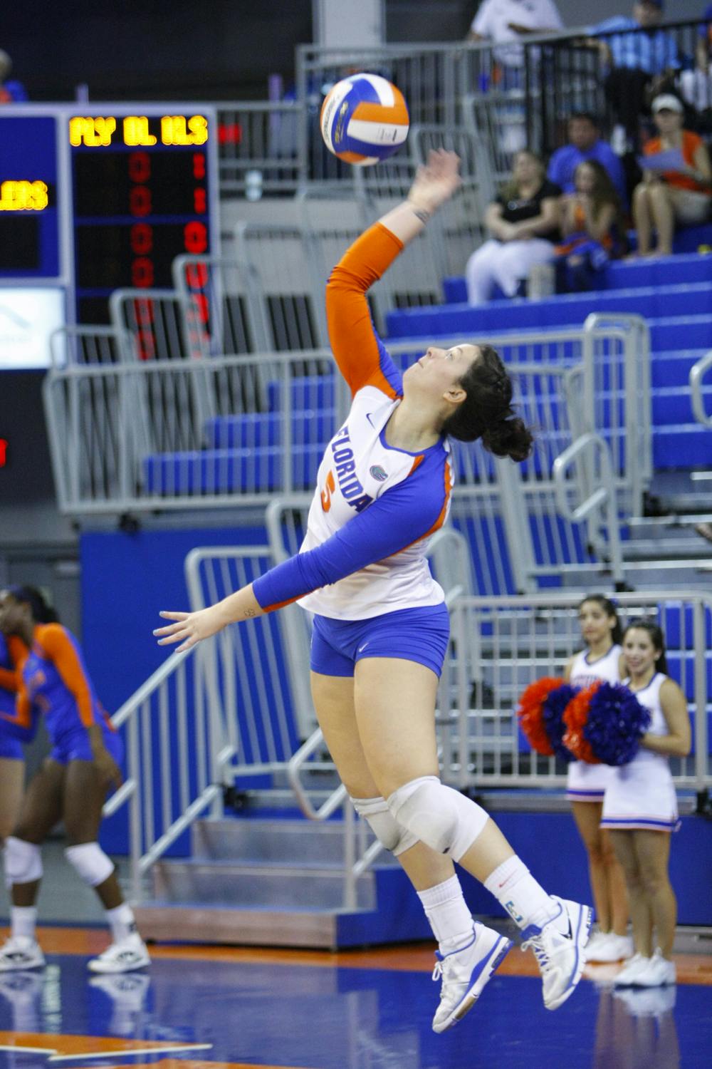 <p align="justify">Junior libero Taylor Unroe serves against Florida A&amp;M on Aug. 25, 2012, in the O’Connell Center. UF won the match 3-0.</p>