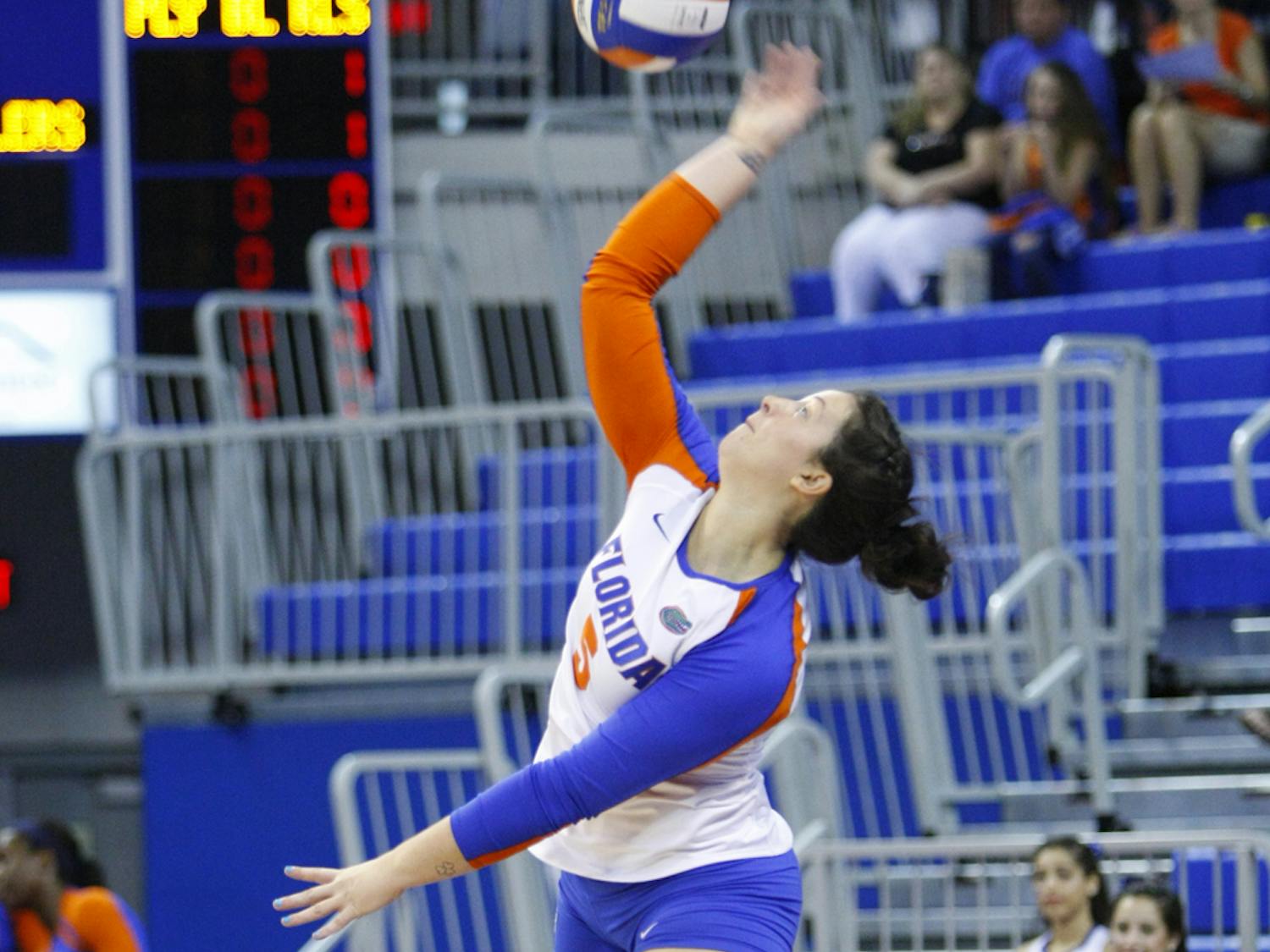Junior libero Taylor Unroe serves against Florida A&amp;M on Aug. 25, 2012, in the O’Connell Center. UF won the match 3-0.