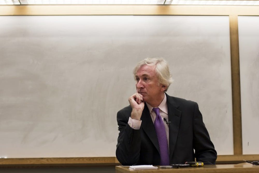 <p>Political journalist Steve Bousquet listens to questions from audience members on Tuesday at the Bob Graham Center for Public Service.</p>