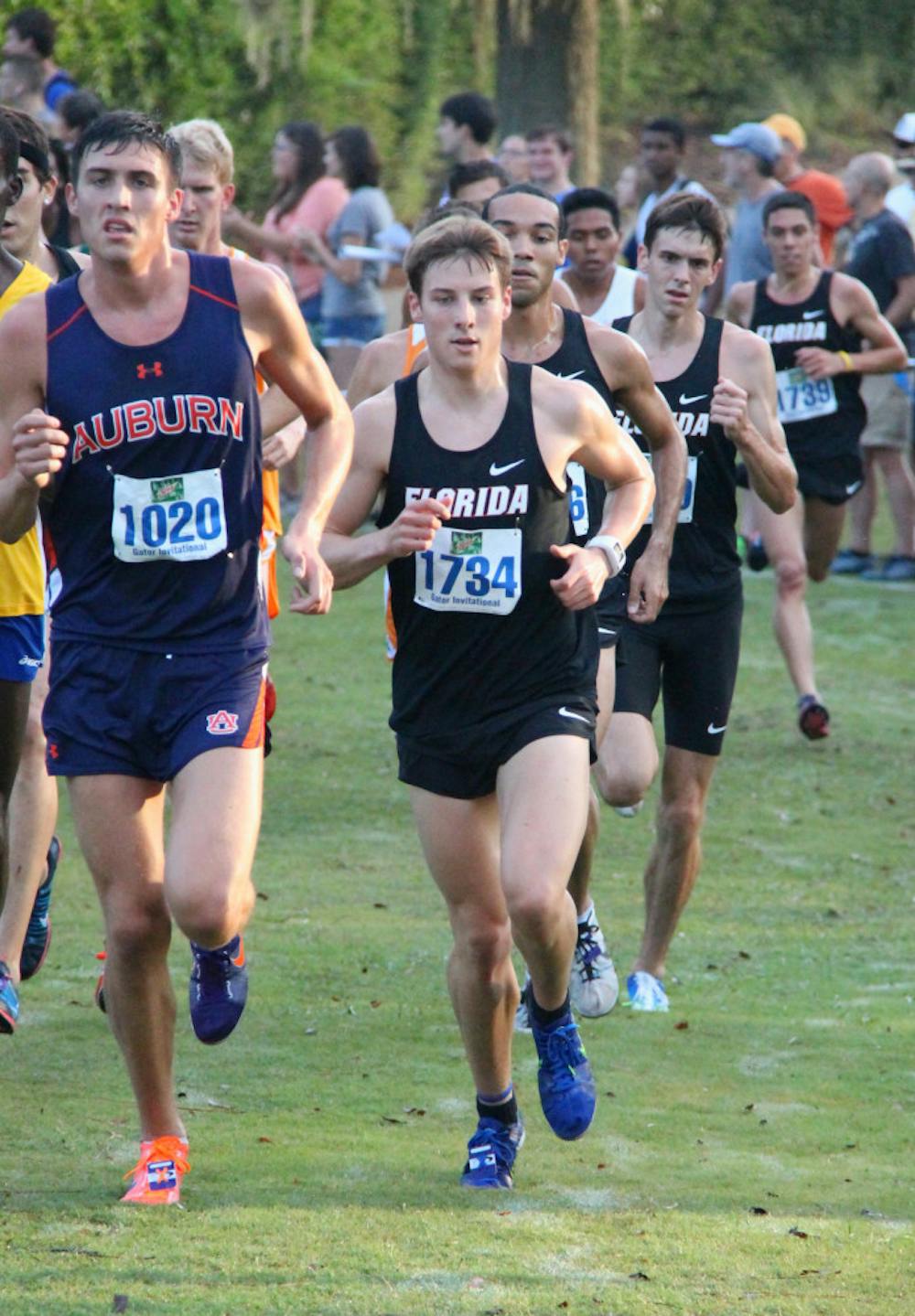 <p>Junior Jimmy Clark (1734) races during the Mountain Dew Invitational on Sept. 14 in Gainesville.</p>