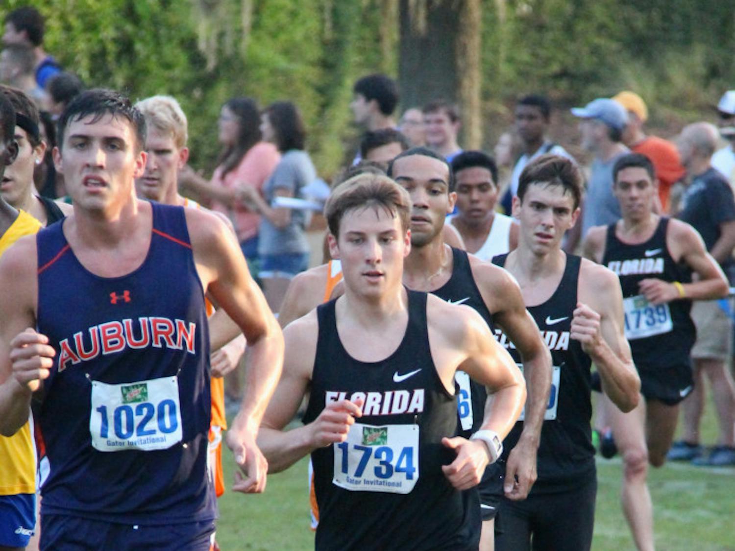 Junior Jimmy Clark (1734) races during the Mountain Dew Invitational on Sept. 14 in Gainesville.