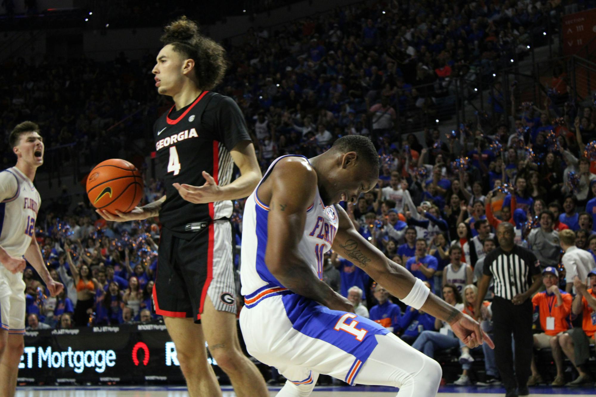 Graduate student guard Kyle Lofton celebrates after scoring and drawing a foul against the Georgia Bulldogs Saturday, Jan. 7, 2023. 