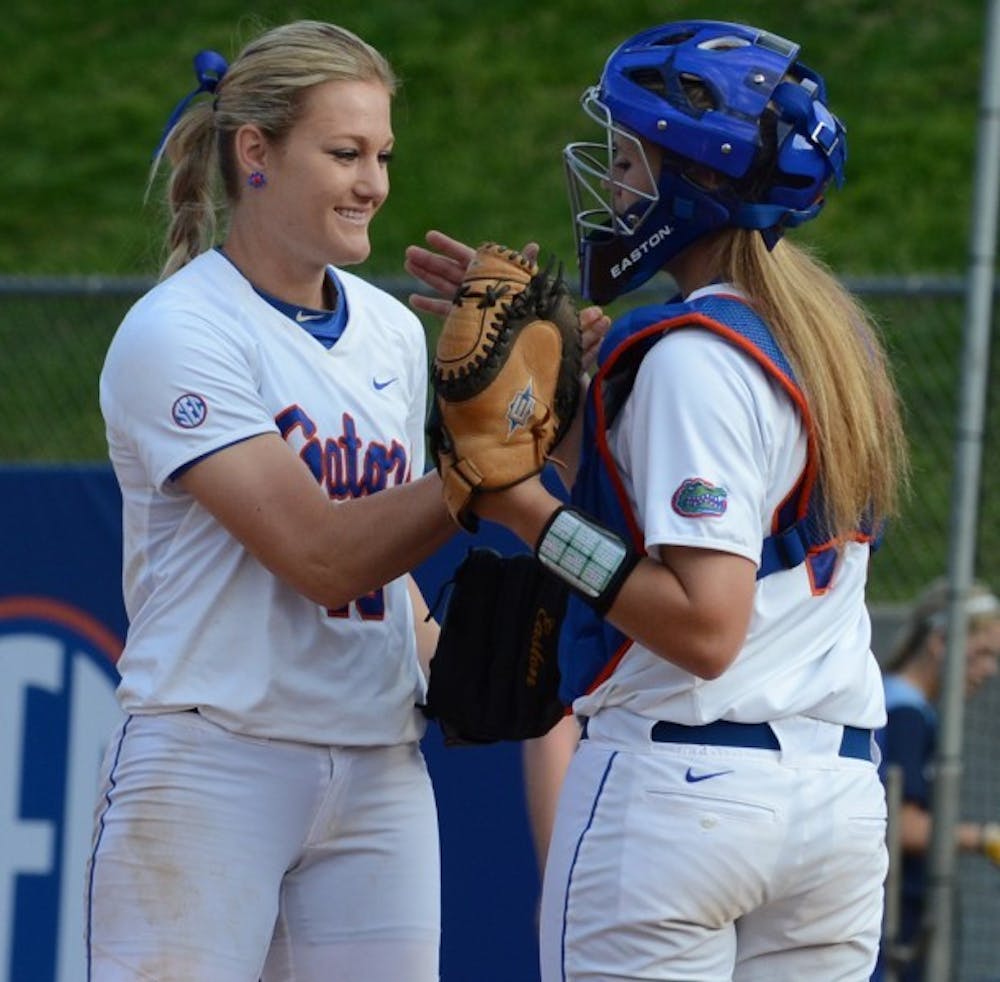 <p>Entrenched as the No. 1 starter after a stellar freshman season, Gators sophomore pitcher Hannah Rogers (left) said she doesn’t mind sharing time this season with highly touted freshmen hurlers Alyssa Bache and Lauren Haeger.</p>