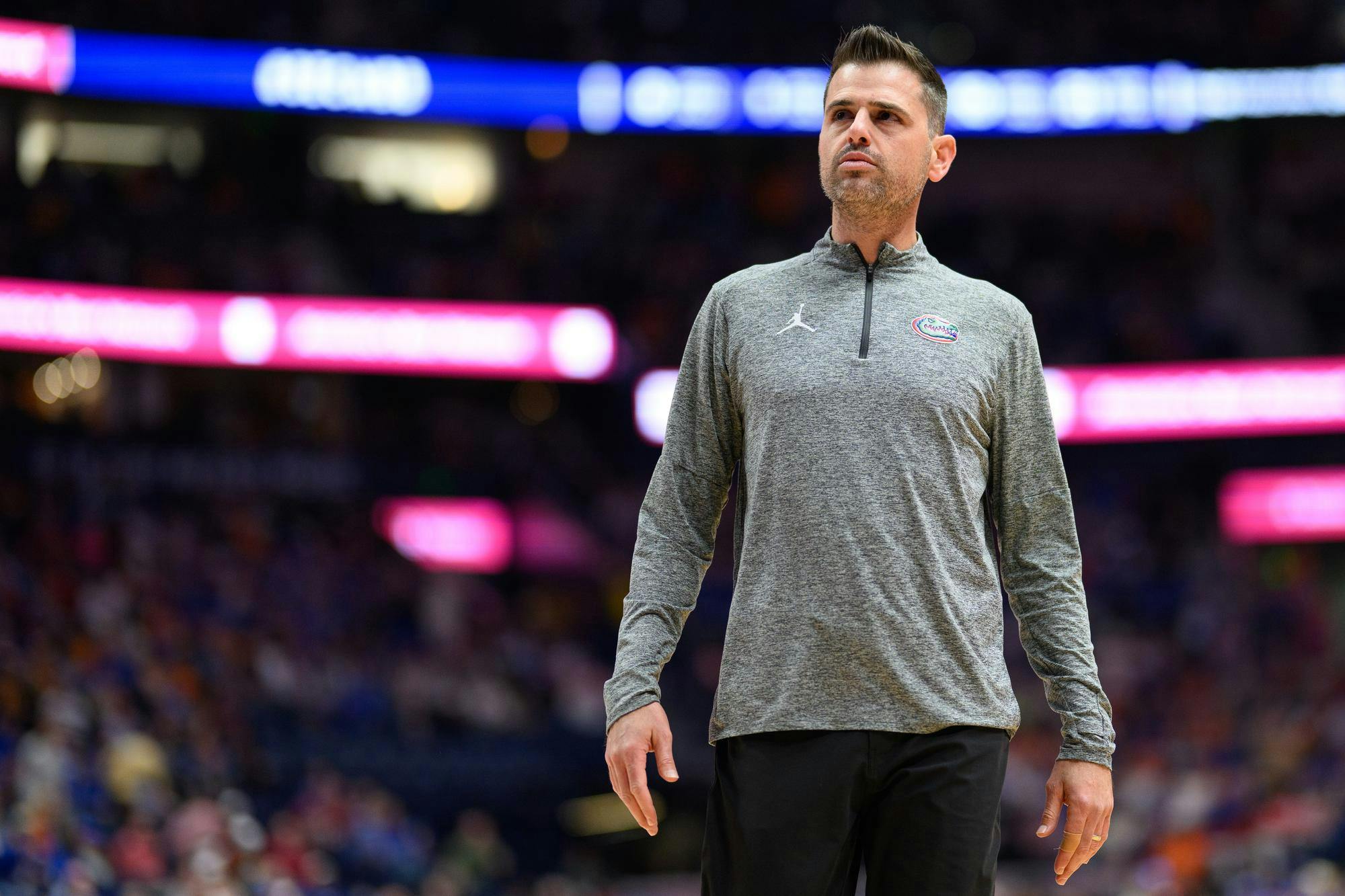 Florida head coach Todd Golden walks near his bench during the second half of an SEC Men's Basketball Tournament quarterfinal game against Kentucky, Friday, March 13, 2026, in Nashville, Tenn.
