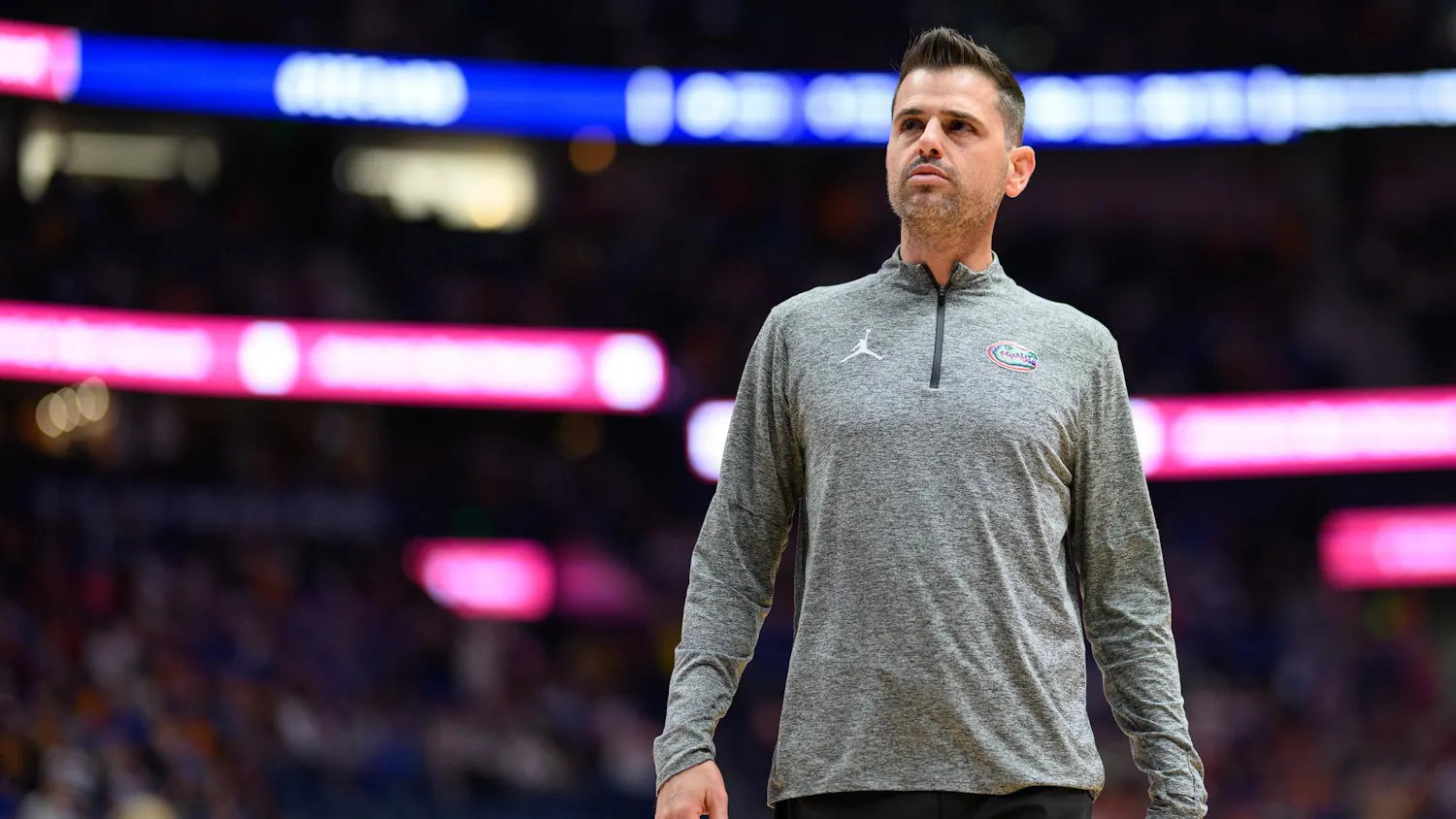 Florida head coach Todd Golden walks near his bench during the second half of an SEC Men's Basketball Tournament quarterfinal game against Kentucky, Friday, March 13, 2026, in Nashville, Tenn.