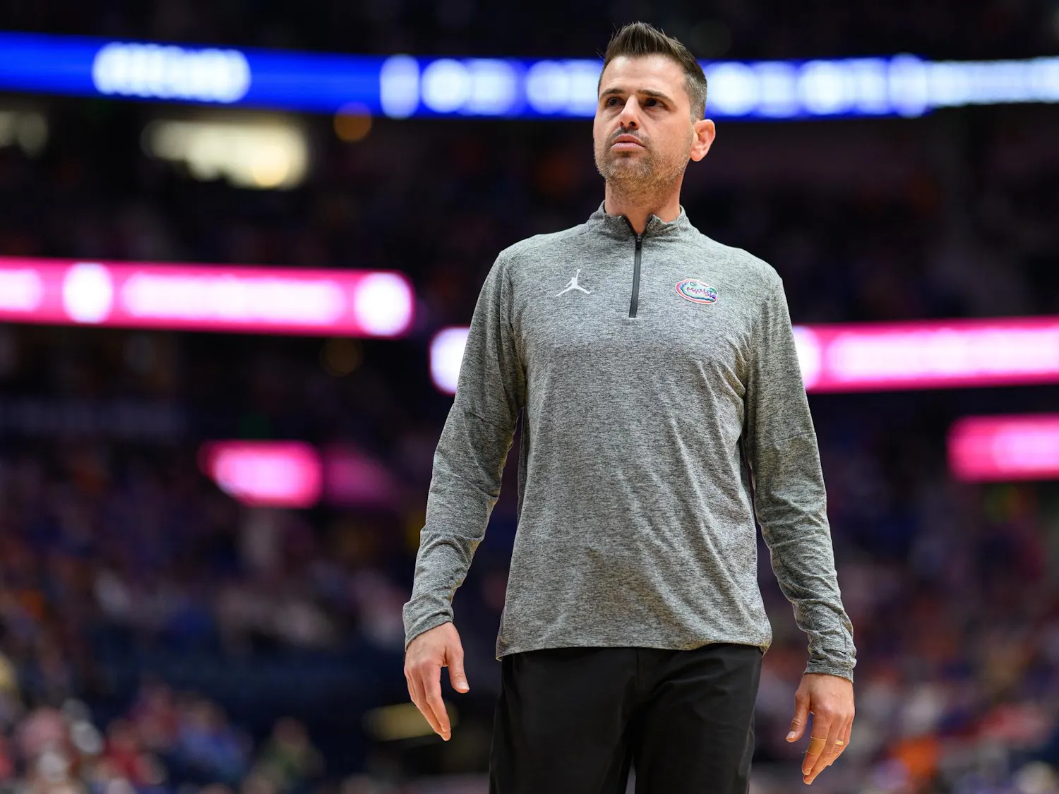Florida head coach Todd Golden walks near his bench during the second half of an SEC Men's Basketball Tournament quarterfinal game against Kentucky, Friday, March 13, 2026, in Nashville, Tenn.