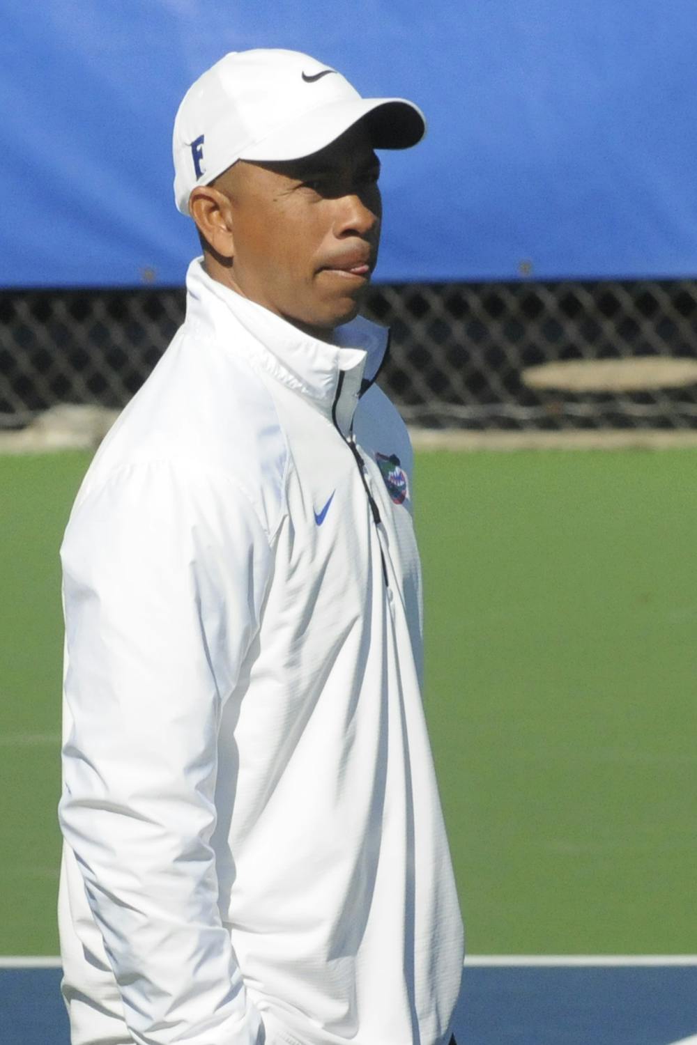 <p>UF men's tennis coach Bryan Shelton looks on during Florida's 6-1 win over Troy on Jan. 17, 2016, at the Ring Tennis Complex. </p>