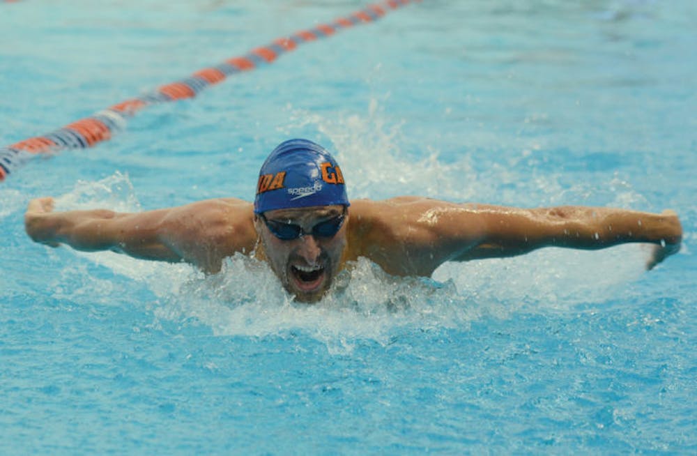 <p>Senior Sebastien Rousseau swims the butterfly in the men’s 400-meter individual medley on Aug. 28 in the Pinch A Penny All Florida Invitational.&nbsp;Rousseau and the Gators start competition at the NCAA Championships today.</p>