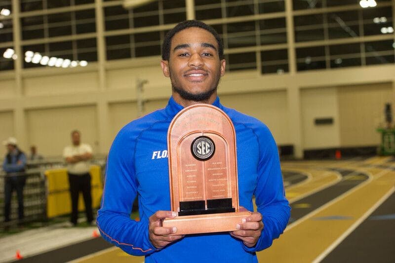 UF's KeAndre Bates poses with a trophy during the SEC Indoor Championships, which ran from Feb. 24-25, 2017, in Nashville, Tennessee. The junior&nbsp;won titles in the men’s long jump and men's triple jump.&nbsp;